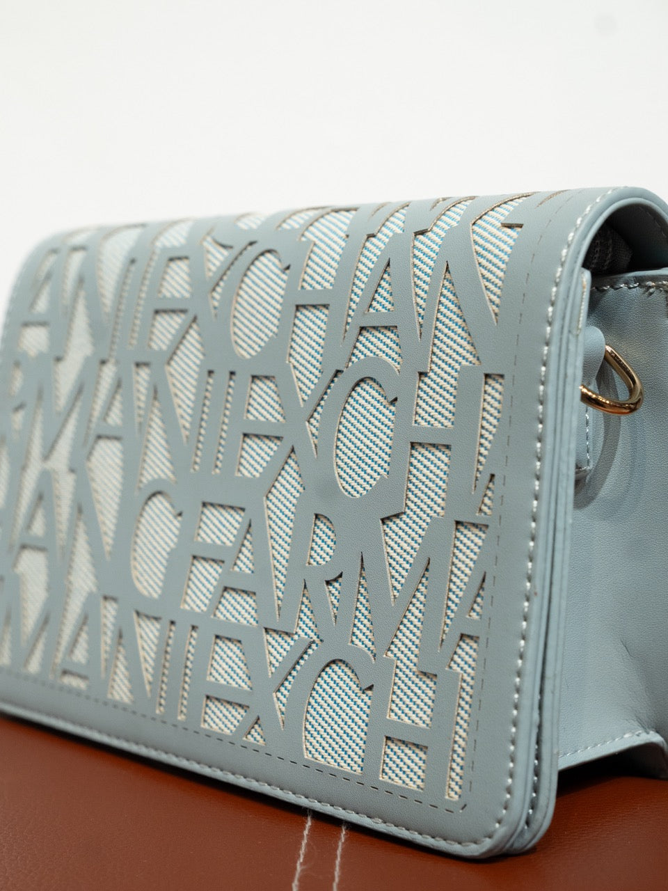 Bolso mediano exchange azul claro muestrarios de ropa moda y accesorios de mujer