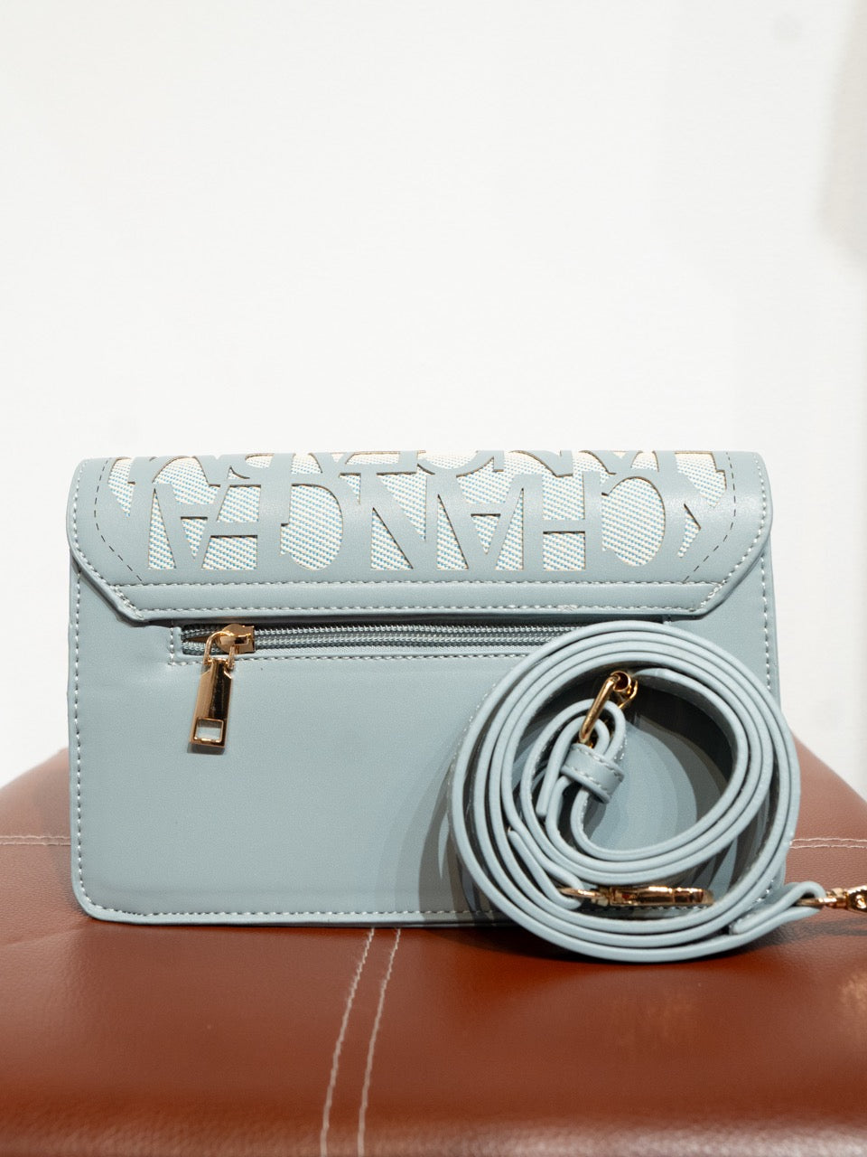 Bolso mediano exchange azul claro muestrarios de ropa moda y accesorios de mujer