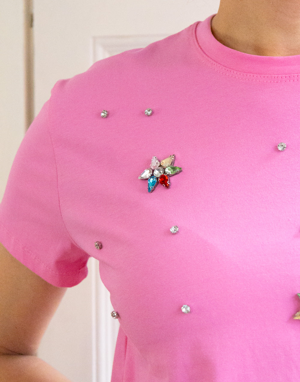 Camiseta estrellas de pedrería rosa muestrarios de ropa y moda de mujer vestir bien mujer mediana edad