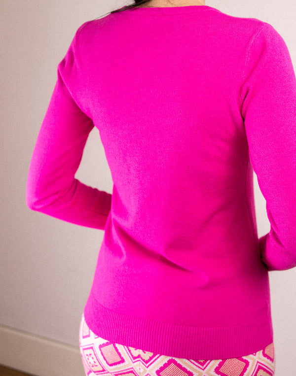 Jersey básico entallado cuello pico rosa fucsia muestrarios de ropa y moda de mujer vestir bien con bajo presupuesto