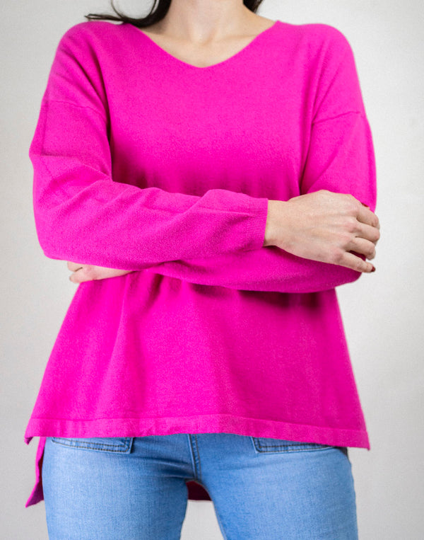 Jersey cuello pico efecto oversize rosa fucsia muestrarios de ropa y moda de mujer vestir bien con tallas grandes