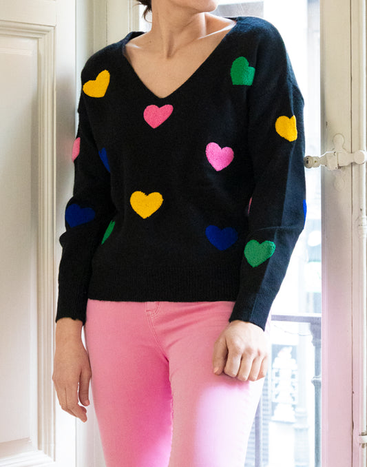 Jersey de corazones de colores negro muestrarios de ropa y moda de mujer vestir bien con mediana edad