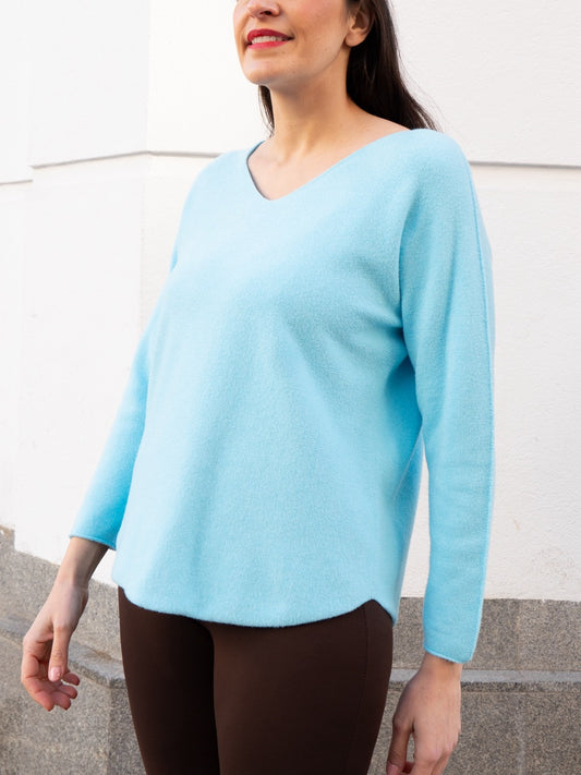 Jersey recto sin costuras cuello pico azul turquesa muestrarios de ropa y moda de mujer 